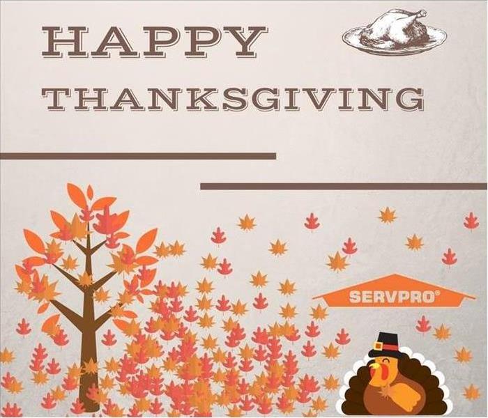 A picture of autumn leaves with a picture of a turkey and the words "Happy Thanksgiving." 