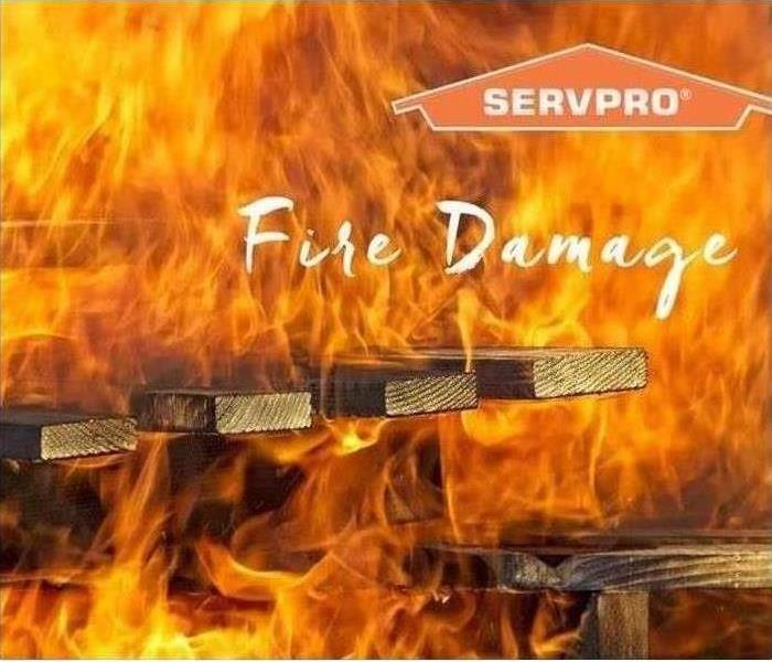Stock image of SERVPRO with kitchen fire in background